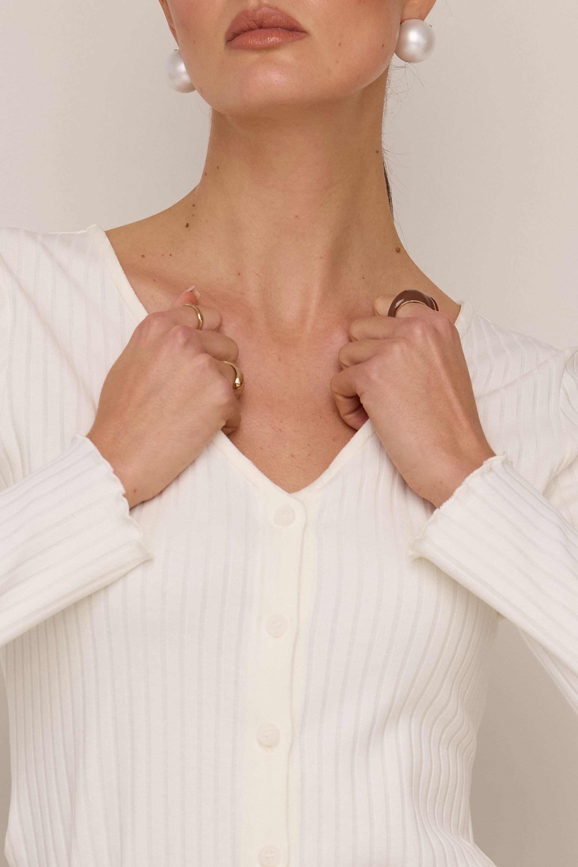 Cream V-neck button-down blouse